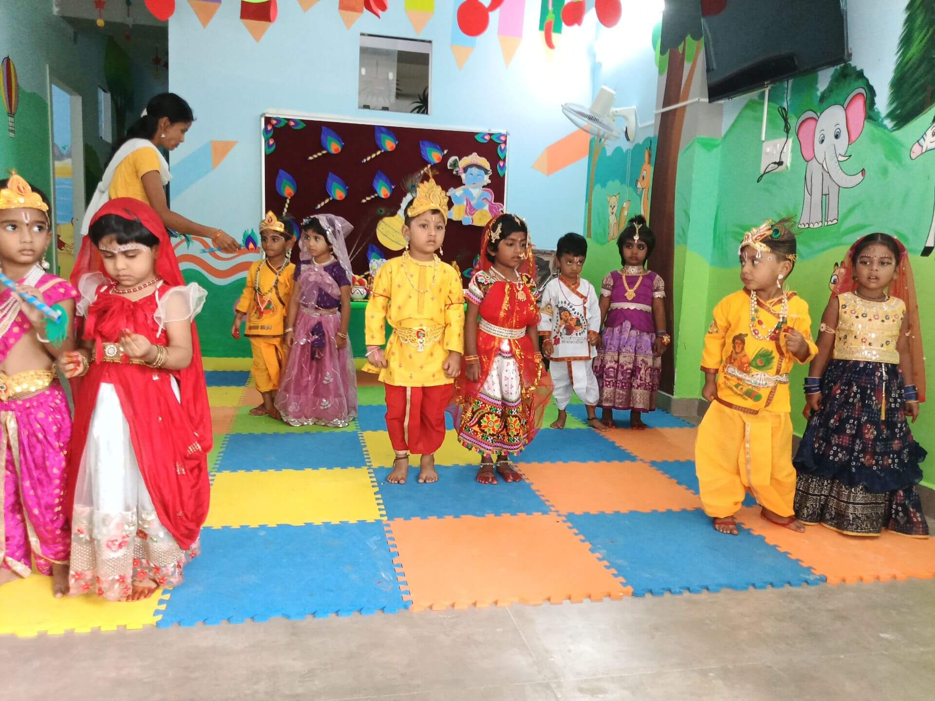 Happy children learning and playing at Little Orchids International School